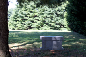 Faithful Friends garden with gray cremation bench.