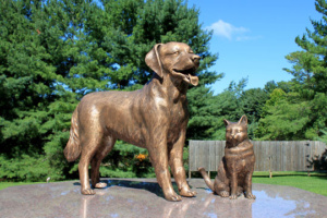 Pet Sanctuary bronze life-sized golden retriever and cat.